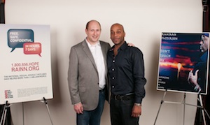 RAINN president Scott Berkowitz and musician Rahsaan Patterson pose together