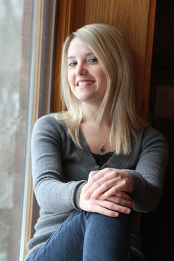 Erin Merryn, advocate for Erin's Law, sits near a window. 