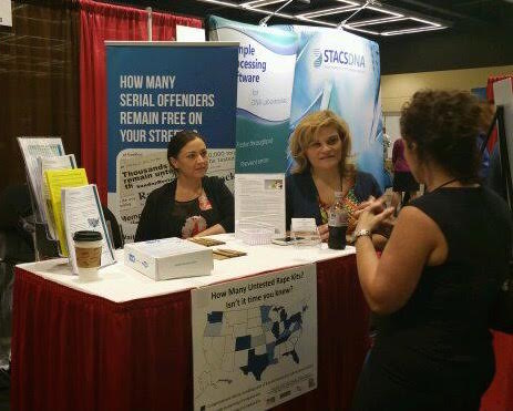 Natasha Alexenko and Helena Lazaro of Natasha's Justice Project host a booth at the National Conference of State Legislatures