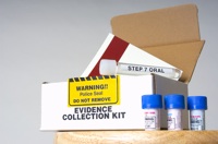 A white box and set of vials on a table labeled "Evidence Collection Kit"