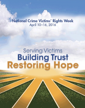 Promotional poster reading "National Crime Victims' Rights Week, April 10-16, 2016. Serving Victims, Building Trust, Restoring Hope." Words printed over rays of sunshine, clouds, and a green field. 